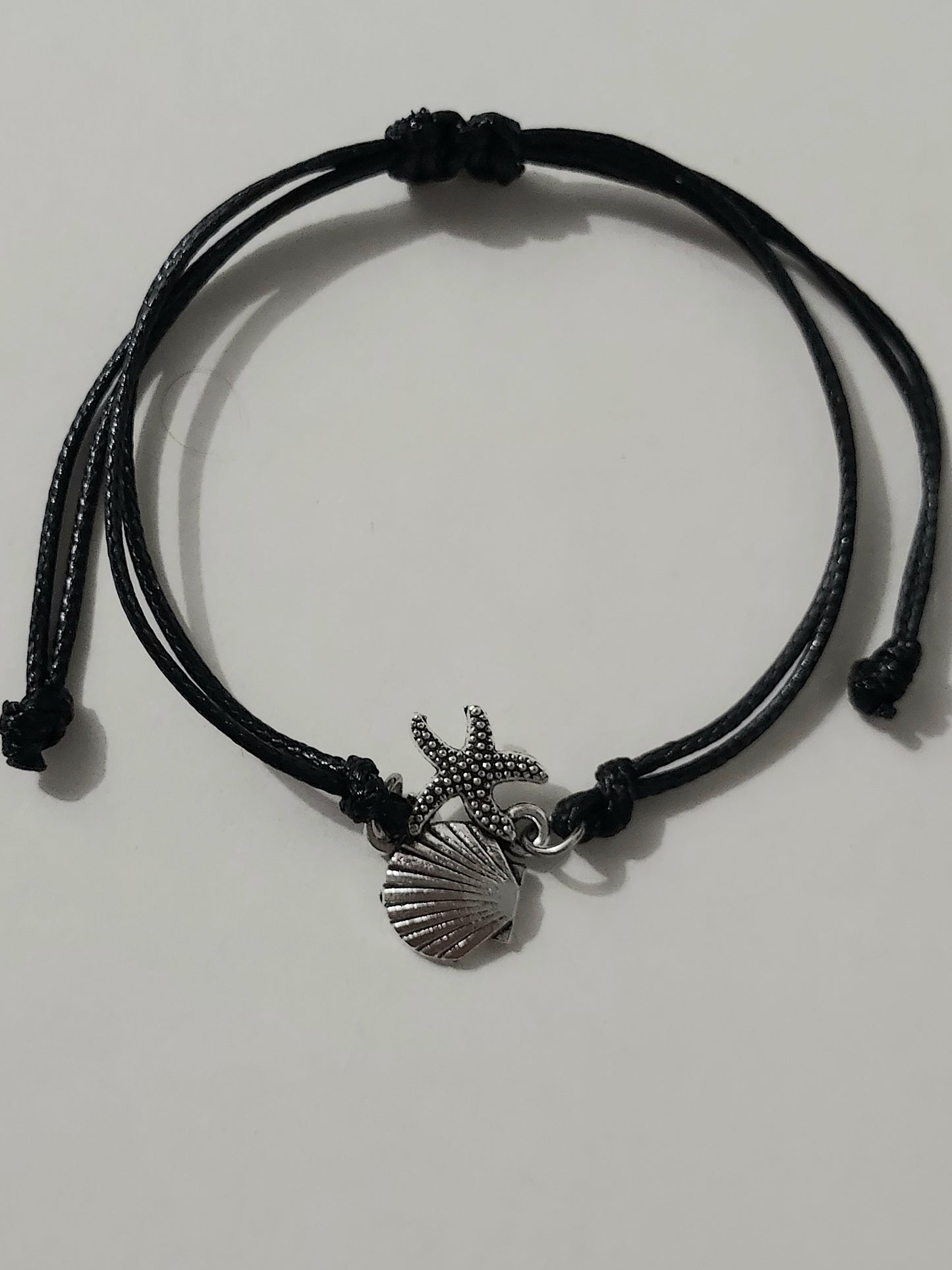 Bracelet réglable noir motif coquillage argenté unisex - Shella