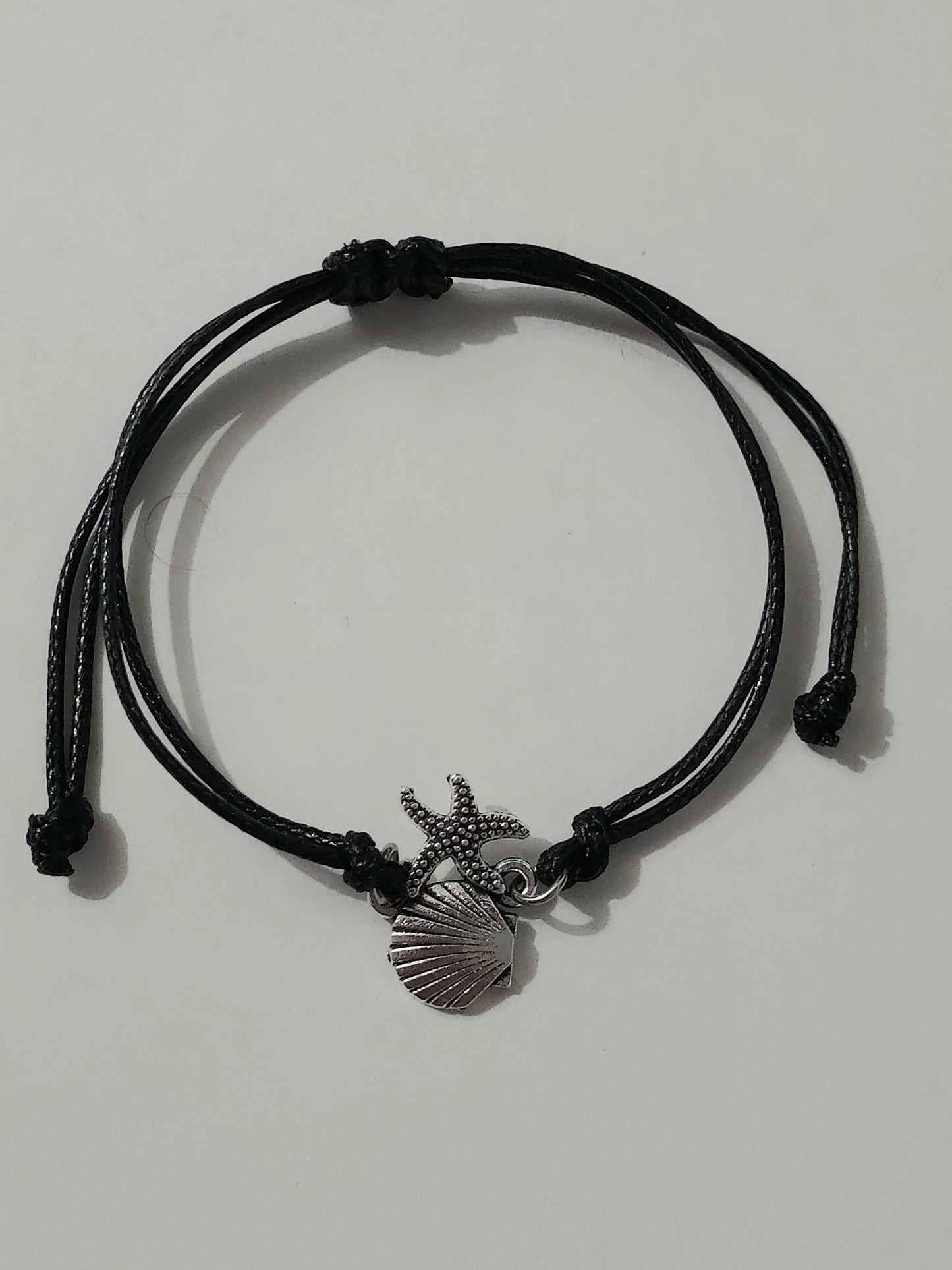 Bracelet réglable noir motif coquillage argenté unisex - Shella