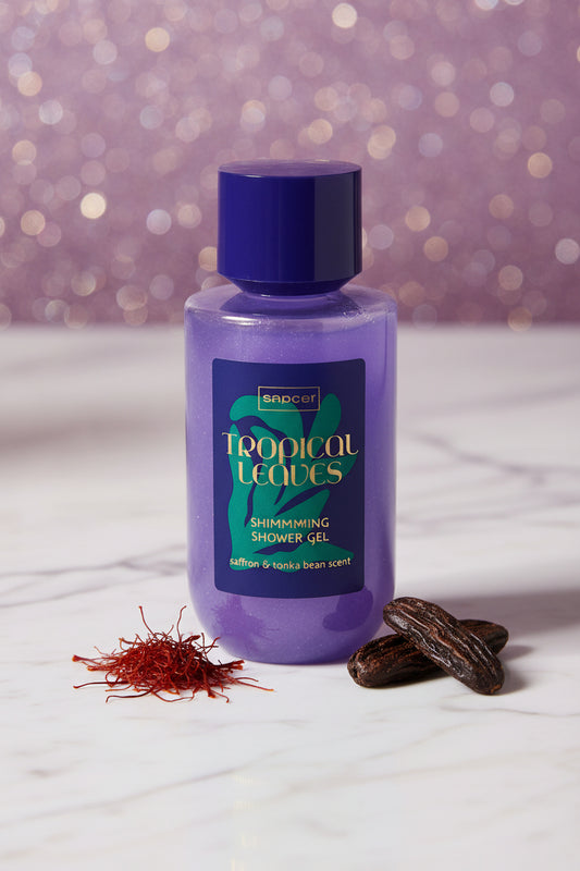 Gel douche scintillant LunellaB Collection Sence Tropical Leaves, bouteille transparente avec étiquette colorée et liquide translucide.