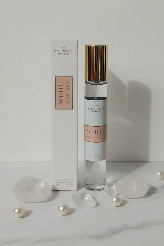 Flacon d'eau de toilette femme Reyes Queen White Crystal LunellaB 33ml avec packaging élégant et design blanc.